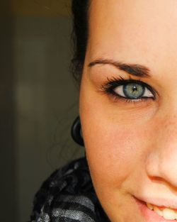 Close-up portrait of woman at home