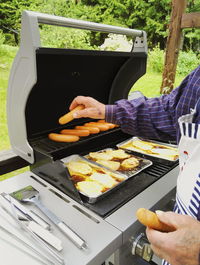 Close-up of man preparing food