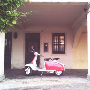Vintage car outside house