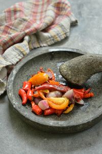 Ingredients for making chili sambal on the stone grinder 