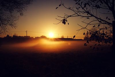 Scenic view of silhouette landscape against sky during sunset