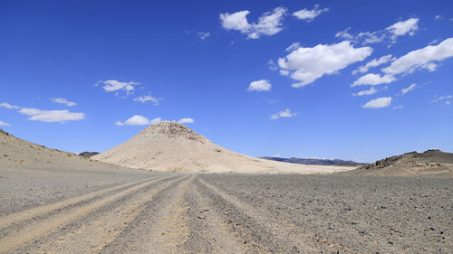 Scenic view of desert against sky