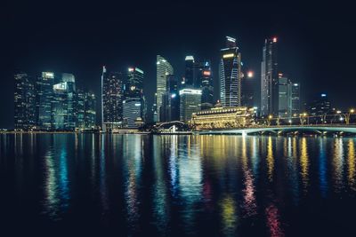 Illuminated city lit up at night