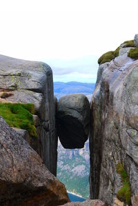 Scenic view of rock formations against sky