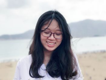 Portrait of smiling young woman