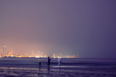 Scenic view of sea against clear sky during sunset