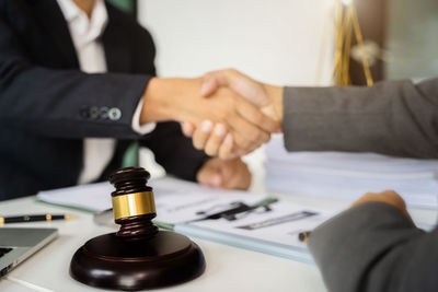 Cropped image of business colleagues shaking hands