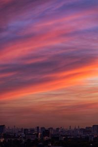 Cityscape against sky during sunset