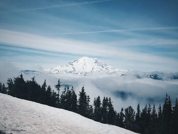 Scenic view of snow covered mt. rainier against sky