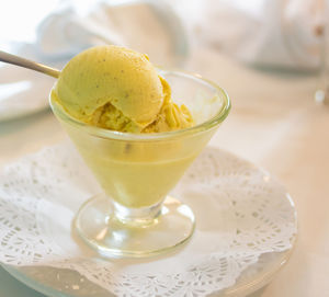 Close-up of ice cream in glass on table