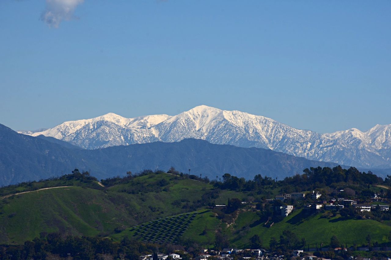 mountain, scenics - nature, environment, sky, landscape, beauty in nature, mountain range, nature, architecture, clear sky, tree, plant, building, no people, copy space, land, outdoors, snow, tranquility, tranquil scene, snowcapped mountain, range