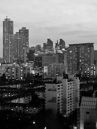 Buildings in city against sky