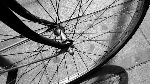 Cropped image of bicycle on footpath
