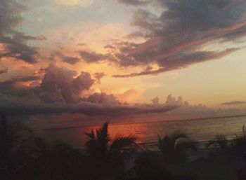 Scenic view of landscape against cloudy sky