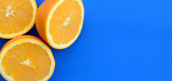 Orange slices against blue background