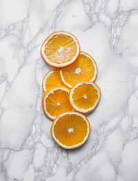 High angle view of orange slices on table