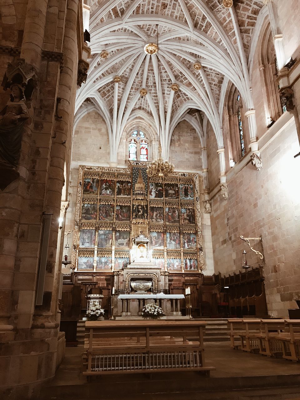 place of worship, religion, architecture, spirituality, arch, indoors, low angle view, history, window, built structure, pew, altar, no people, day