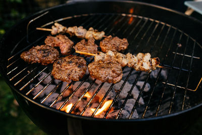 Close-up of meat on barbecue grill