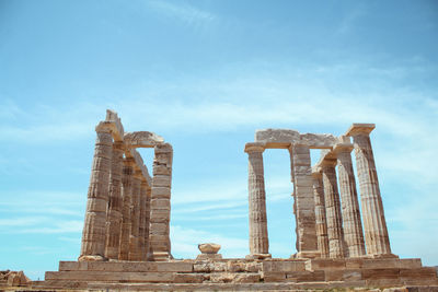 Low angle view of cape sounion-temple of poseidon  against sky