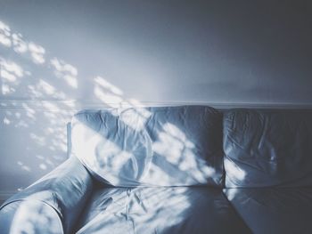 Sunlight falling on sofa at home