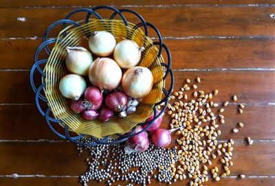 High angle view of fruits in basket on table