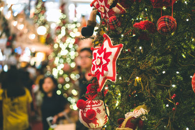 Close-up of christmas decoration hanging on tree