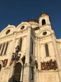 Low angle view of building against blue sky