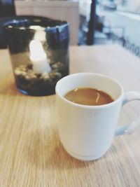 Close-up of tea cup on table