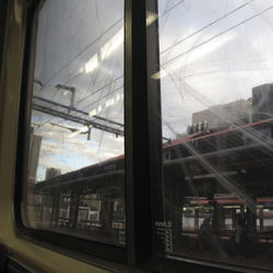 Railroad tracks seen through train window