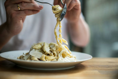 Close-up of person preparing food