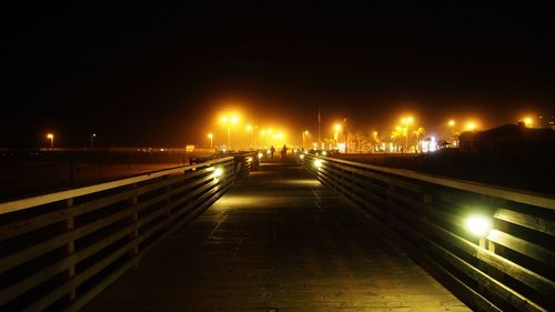 Illuminated street light at night