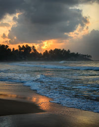 Scenic view of sea at sunset