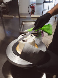 Cropped image of man preparing food