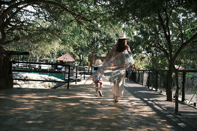 People on footpath in park