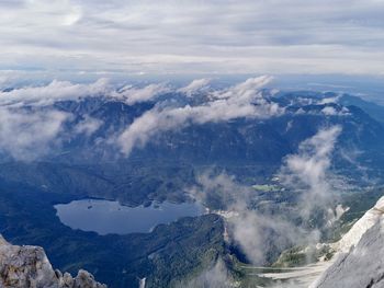 Aerial view of mountain range against sky