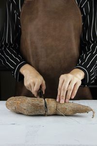 Close-up of man preparing food