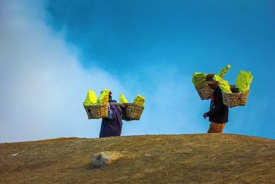 Ijen crater sulfur mining activities 