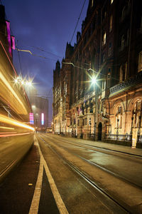 Illuminated street at night