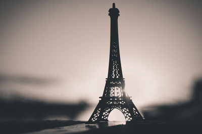 Close-up of tower against sky during sunset