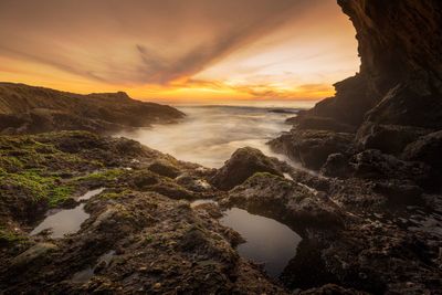 Scenic view of sea against sky during sunset