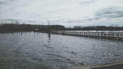 View of river against cloudy sky