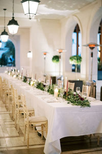 Empty chairs and tables in restaurant