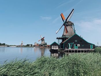 Traditional windmill against sky