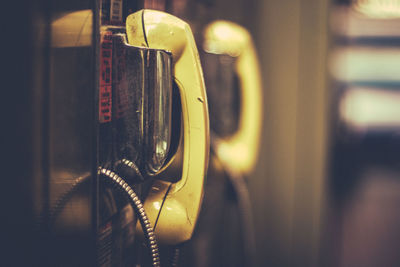 Close-up of telephone in booth