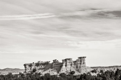 Panoramic view of rock formations against sky