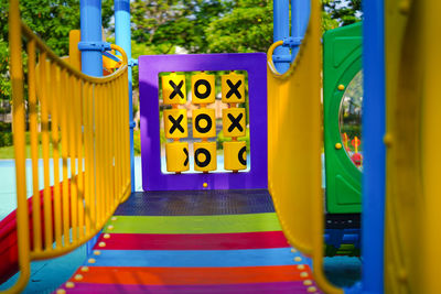 Close-up of yellow train on playground