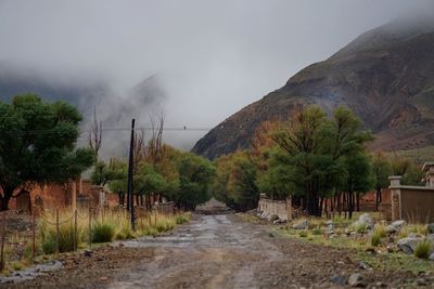 Scenic view of landscape against cloudy sky