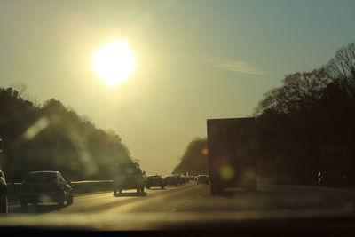 Sun shining through city street