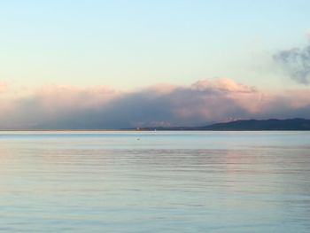 Scenic view of sea against sky at sunset