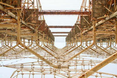 Metal structure against sky